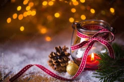 Fotografia Advent, Christmas - Burning Candle In Snow Landscape With Bokeh Background