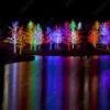 Fotografia Trees Tightly Wrapped In LED Lights For The Christmas Holidays R -Clementoni Outlet 1000 F 75472473 eiz0KByDDT3dQQKIx1XhiEu3ppDF2GFX